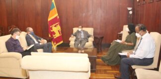 Foreign Minister Prof. G. L. Peiris meets with Canadian High Commissioner David McKinnon