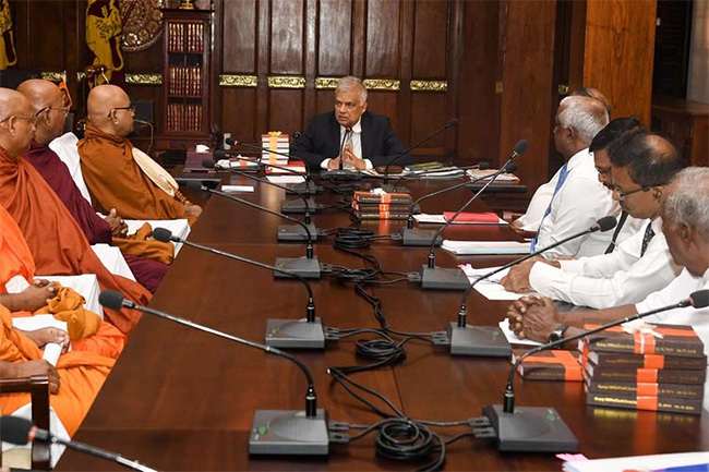 President pledges full support of state to safeguard Theravada Buddhism