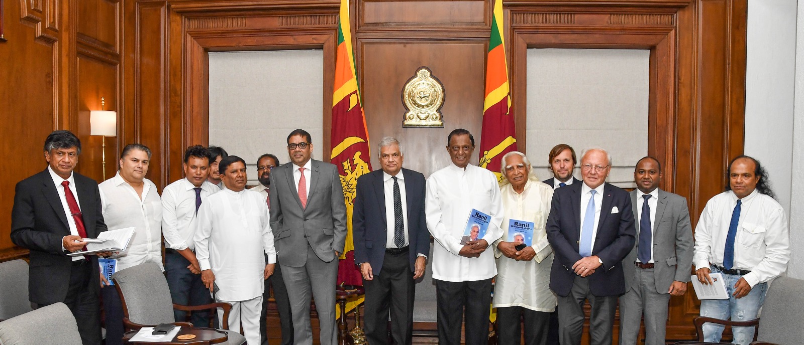 The third edition of “Ranil Wickremesinghe, A Political Biography” presented to the President