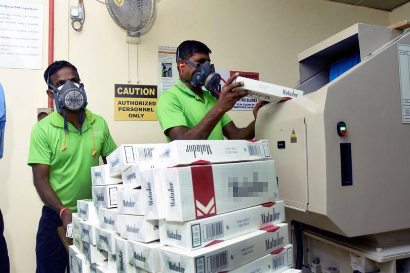 Customs destroy counterfeit cigarettes
