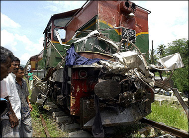 Tourist bus collides with train on unsafe level crossing