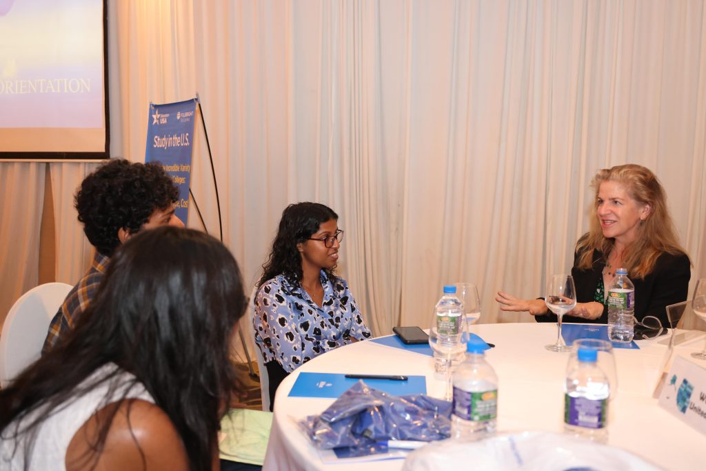 Fulbright Commission board chair Heidi Hattenbach engaging with Sri Lankan students at their predeparture orientation