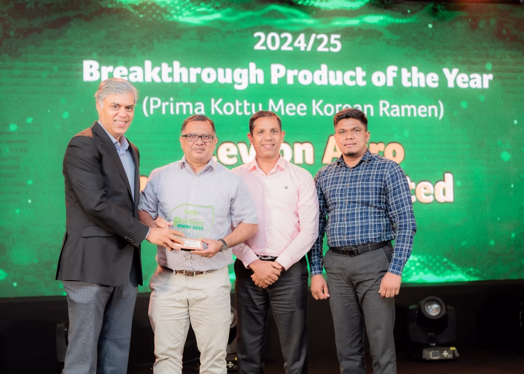 From Left to Right: Mr. Charitha Subasinghe, President of Retail at John Keells Holdings PLC, presenting the award to Mr. Sajith Gunaratne, General Manager of Ceylon Agro Industries Ltd., Prima Group Sri Lanka, alongside Mr. Donavan Ondaatje, Senior Business Manager, and Mr. Gamini Weerathunga, Modern Trade Manager, from Ceylon Agro Industries Ltd., Prima Group Sri Lanka.
